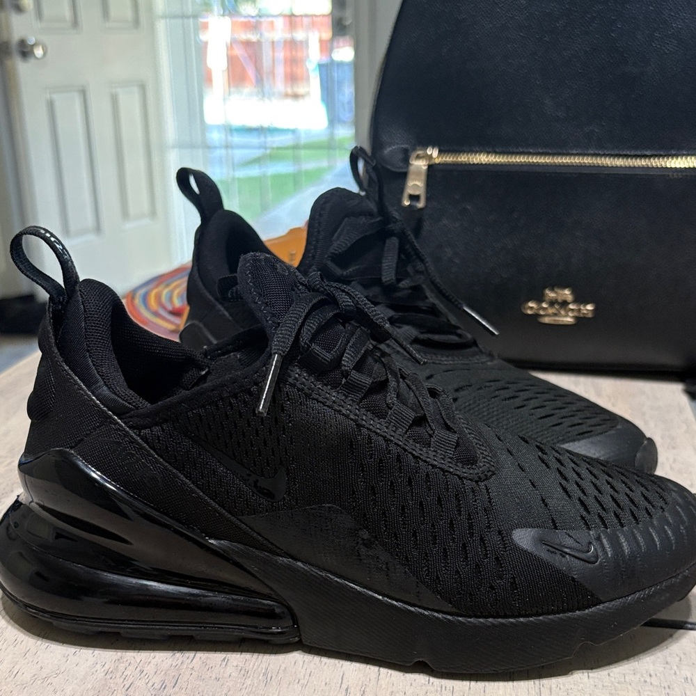 Nike Black Sneakers with Air Cushioning and Modern Design
